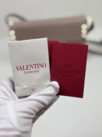 Load image into Gallery viewer, Valentino Garavani Rockstud Medium Crossbody Bag in Poudre Leather
