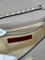 Load image into Gallery viewer, Valentino Garavani Rockstud Medium Crossbody Bag in Poudre Leather
