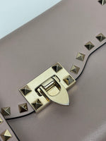 Load image into Gallery viewer, Valentino Garavani Rockstud Medium Crossbody Bag in Poudre Leather
