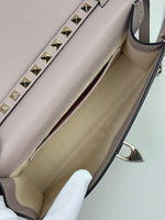 Load image into Gallery viewer, Valentino Garavani Rockstud Medium Crossbody Bag in Poudre Leather
