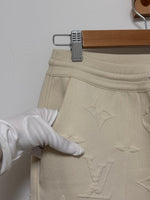 Load image into Gallery viewer, Louis Vuitton monogram embossed cream jogging trousers - S
