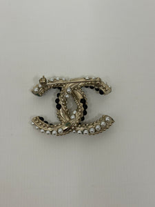 Chanel CC pearl brooch