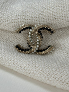 Chanel CC pearl brooch