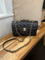 Load image into Gallery viewer, chanel-black-flap-bag-gold-tone-hardware
